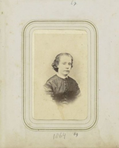 Portrait of a Woman in a Dress with Buttons and Hair Stuck Up