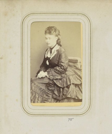 Portrait of a woman in a wide skirt with her hair up