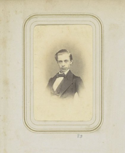 Portrait of a young man in a coat with a cravat