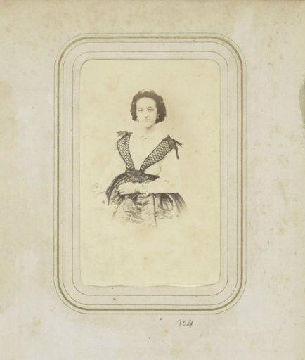 Portrait of a woman in a wide skirt with a white blouse
