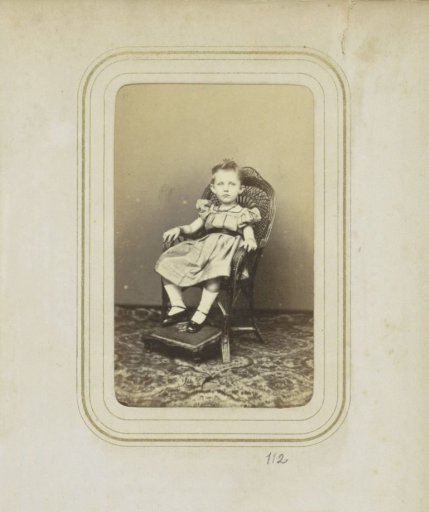 Portrait of a girl in a chair
