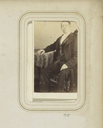 Portrait of a man in a long coat