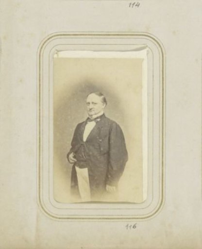 Portrait of a man in a long coat