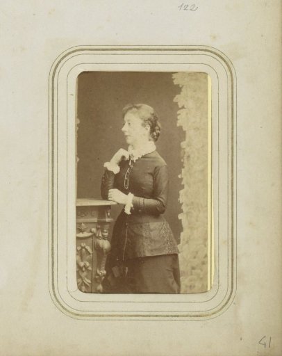 Portrait of a woman in a jacket and skirt, designated as Ans