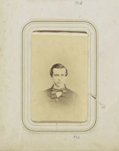 Portrait of a man in a coat with a cravat