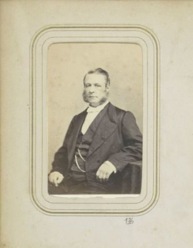 Portrait of a man with a mustache in a jacket