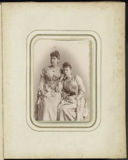 Portrait of two women in dresses