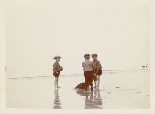 Three boys on the beach at Scheveningen
