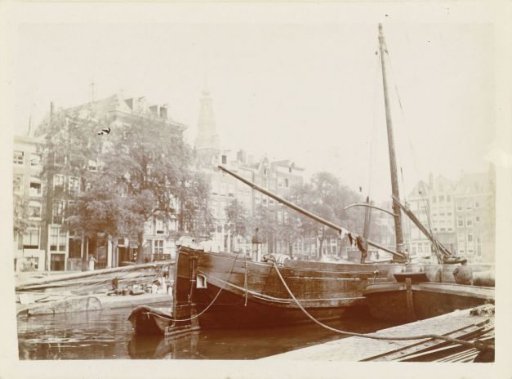 Ship in the Zwanenburgwal with the Zuiderkerk tower in the background