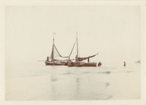 Two fishing boats at the beach of Scheveningen