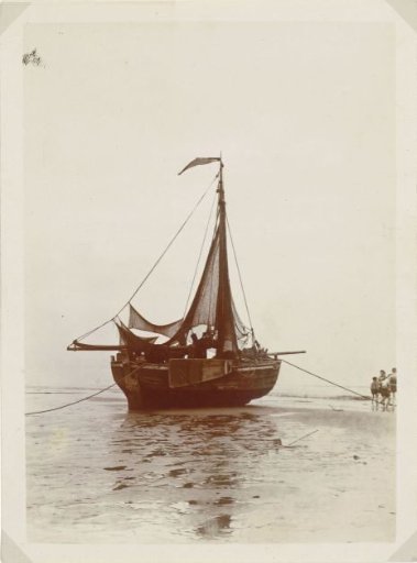 Beached fishing vessel on the beach at Scheveningen