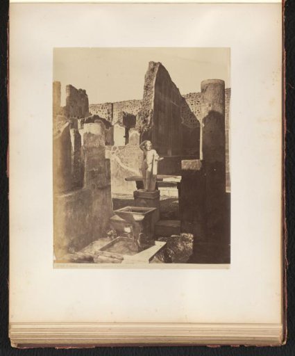 Statue and fountain in the house with the hanging balcony, Pompeii