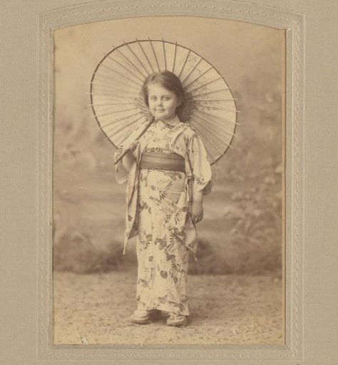 Studio Portrait of a Little Girl in a Kimono with an Umbrella