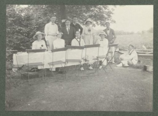Group portrait of the Kessler family at an outdoor table
