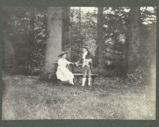 Two costumed people during a performance