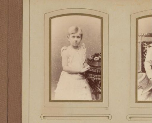 Studio portrait of An Kessler at a table in his youth