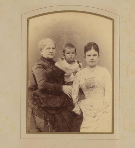 Studio portrait of Mrs. de Lange-Wiggers van Kerchem, Margo J.J. Kessler-de Lange, and baby An