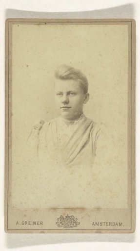 Studio Portrait of a Young Woman with a Pearl Necklace