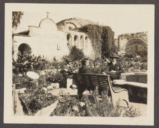 Three Persons in the Courtyard of Mission San Juan Capistrano