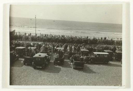 Cars and People on the Boulevard of Scheveningen, Looking at a Procession of Horsemen