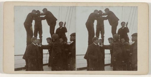 Human pyramid on the deck of a ship