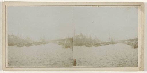Harbor with moored sailing and steamships