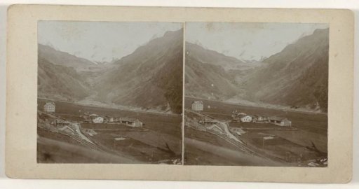 Houses situated along a road in the Austrian mountain landscape