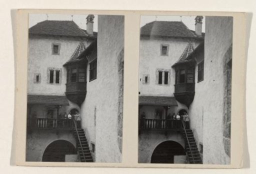 Group on the balustrade of a house