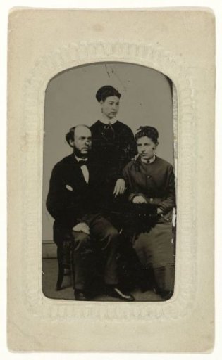 Portrait of a man and two women