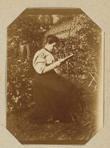Woman reading in a garden