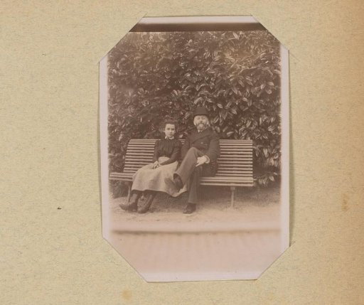 Portrait of a man and a girl on a bench
