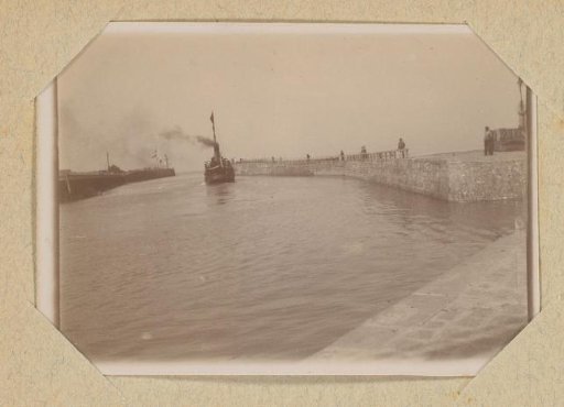 Steamship leaving the harbor