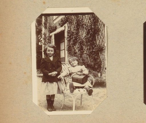 Portrait of two girls in a garden