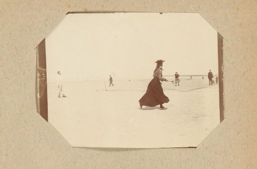 Woman playing tennis on the beach