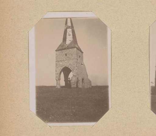 Two people at a ruined church