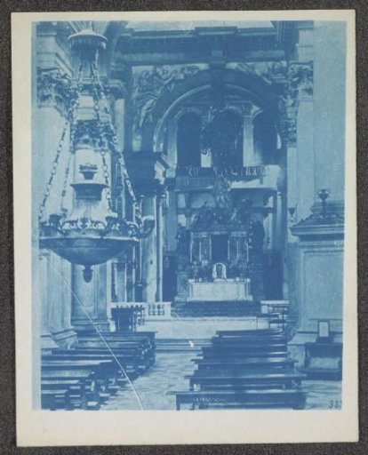 Photographic reproduction of a photograph of a church interior with a chandelier