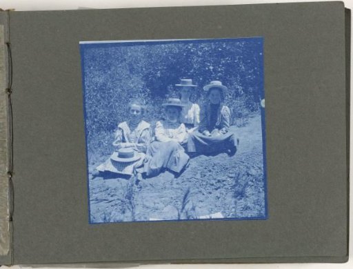 Group portrait of four girls, seated, United States