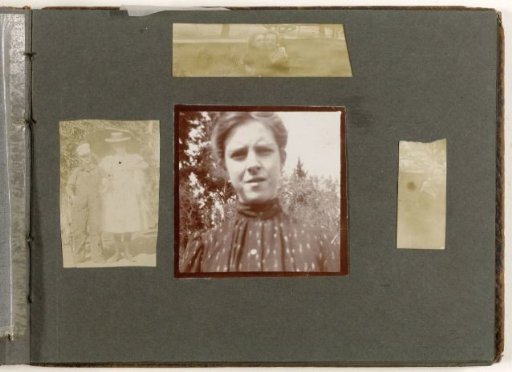 Portrait of a boy and girl, arm in arm, United States