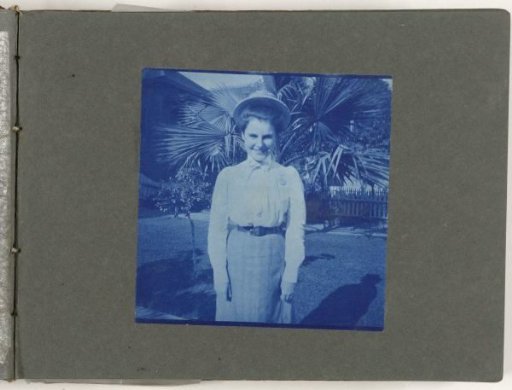 Portrait of a woman near palm trees, United States
