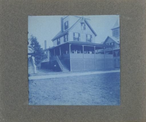 Wooden house with veranda and stairs, United States