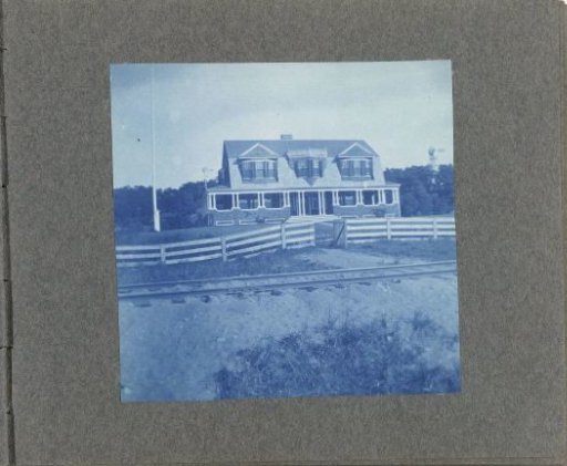 Wooden house with wooden fence, United States