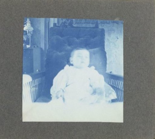 Child sitting in a chair, United States