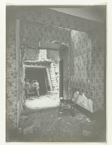 Workers in a house being demolished for the construction of a railway, Paris