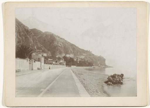 View of the Promenade St. Louis, France, with mountains and coast
