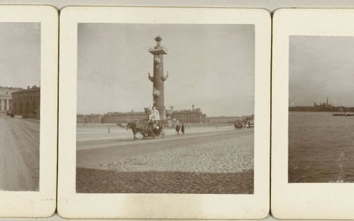 Column with protruding ship bows on the other side of the Neva from Saint Petersburg