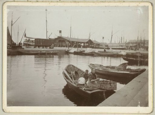 Fish Market in Helsinki with moored boats along the quay