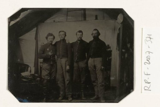 Portrait of Four Soldiers, Standing in a Tent Against a Plain Background, with a Wind Instrument on a Chair to the Left