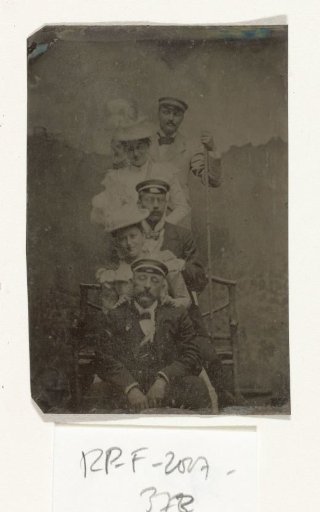 Group Portrait of Three Men and Two Women, Standing and Sitting Before a Painted Backdrop (Mountain with Castle) (Germany?)