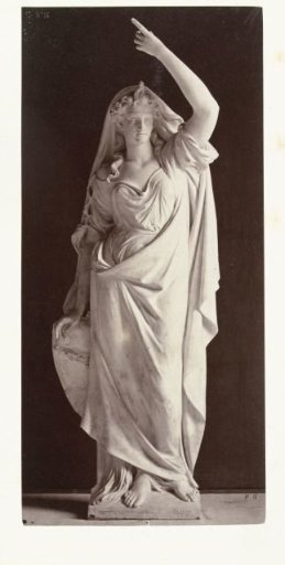 Marble statue of a woman in a robe partially draped over her head.