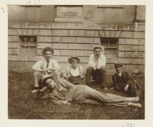 Dolph Kessler with friends on the grass in front of a house in Gainsborough